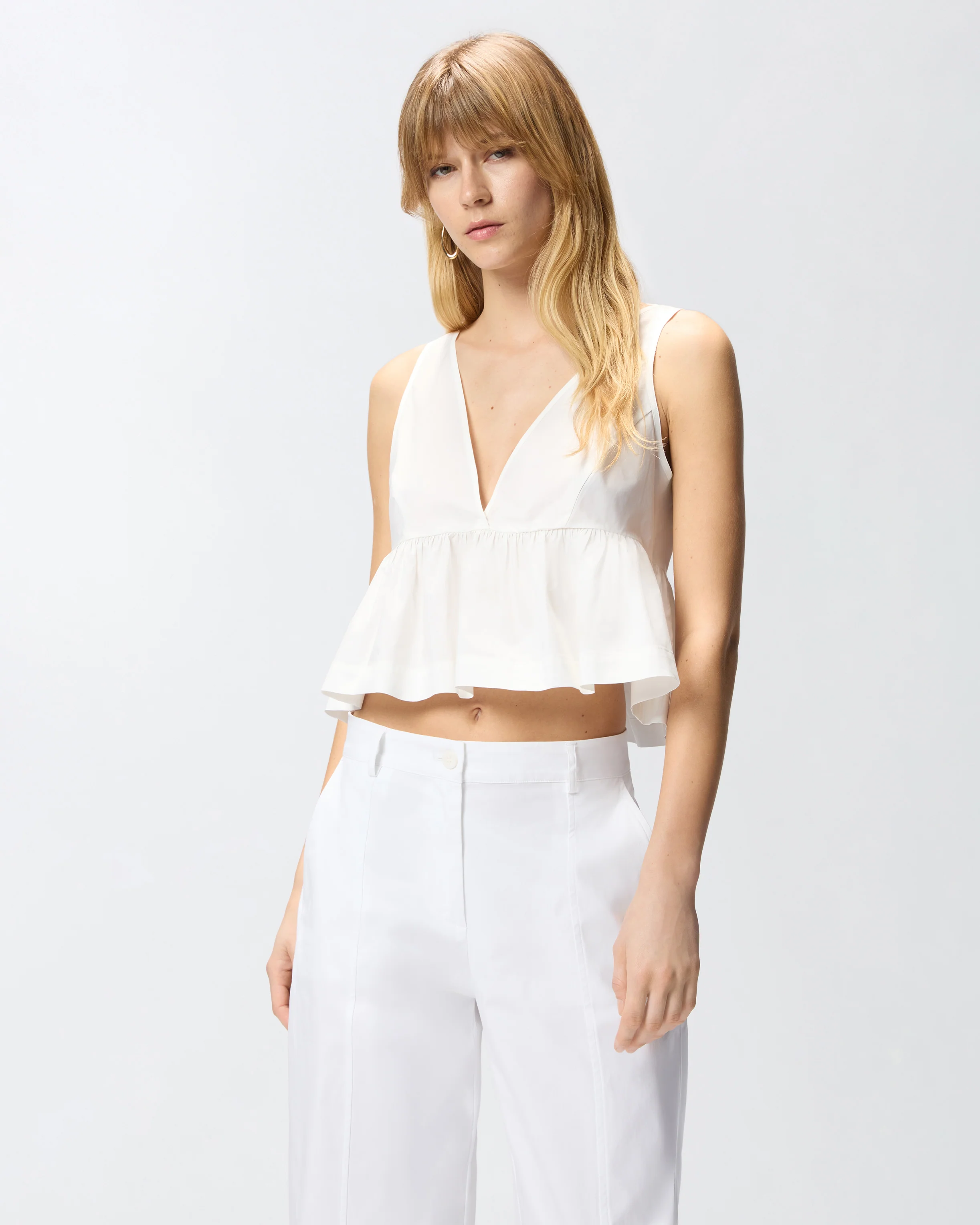 Crop top con volant e laccetti