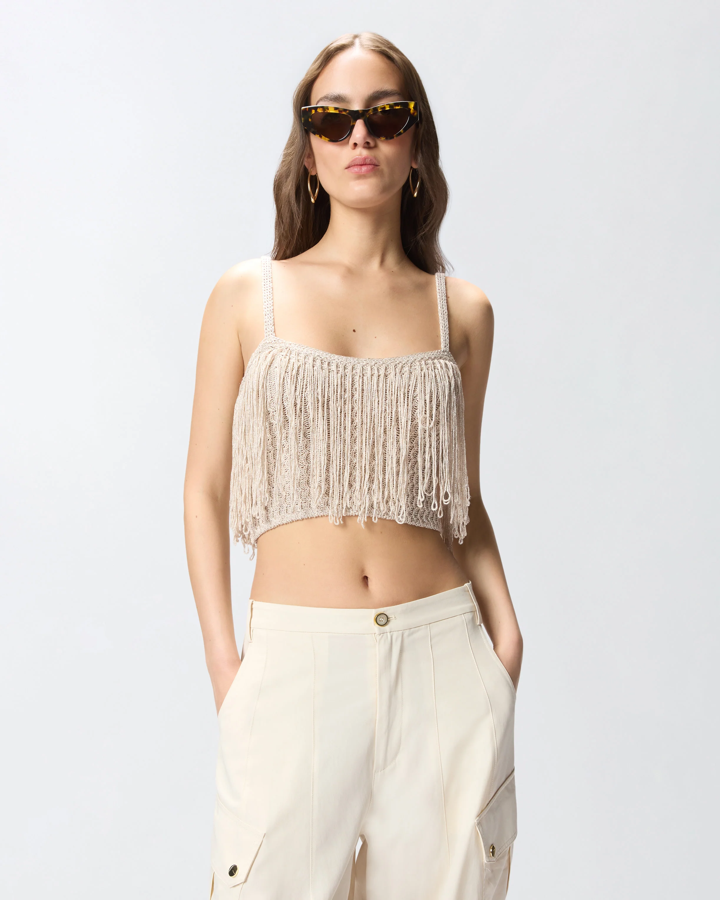 Crop top in maglia con frange
