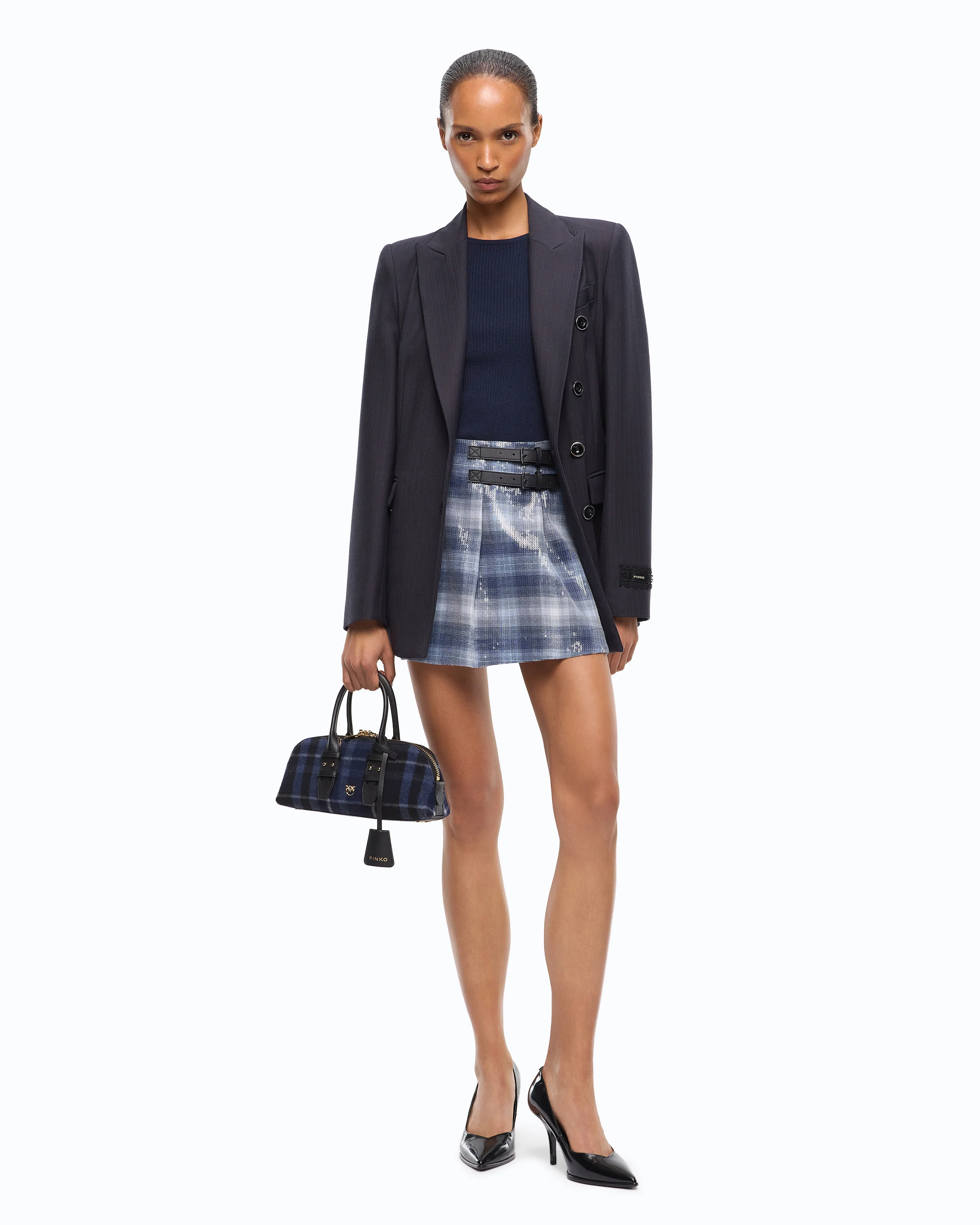 Minigonna con motivo check e paillettes