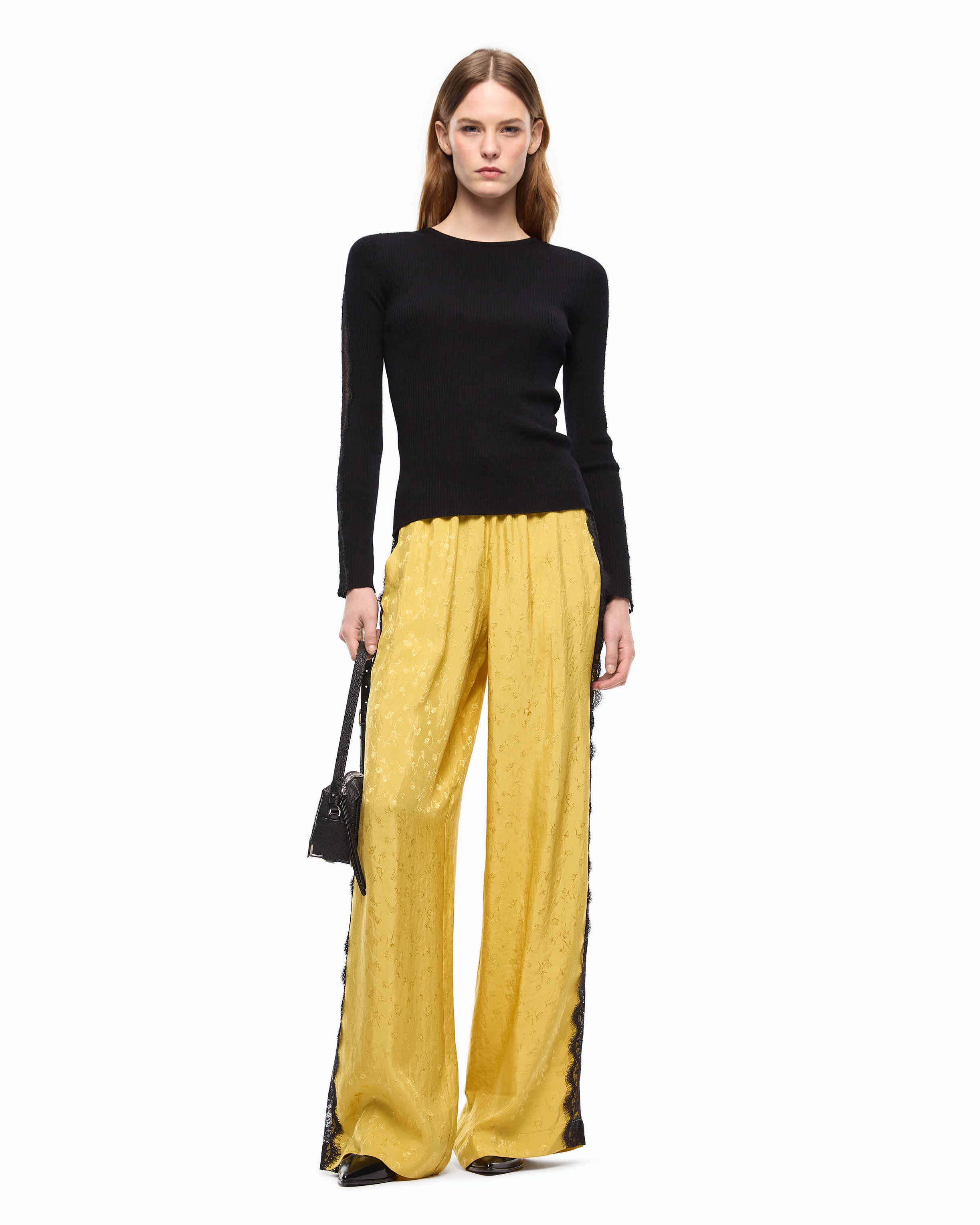 Pantaloni palazzo con motivo floreale e banda in pizzo